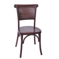 Rattan back chair with solid seat